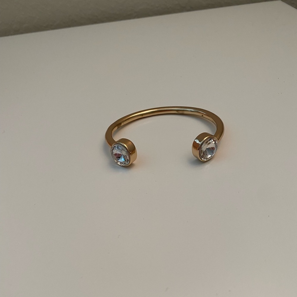 Gold and rhinestone bracelet.
